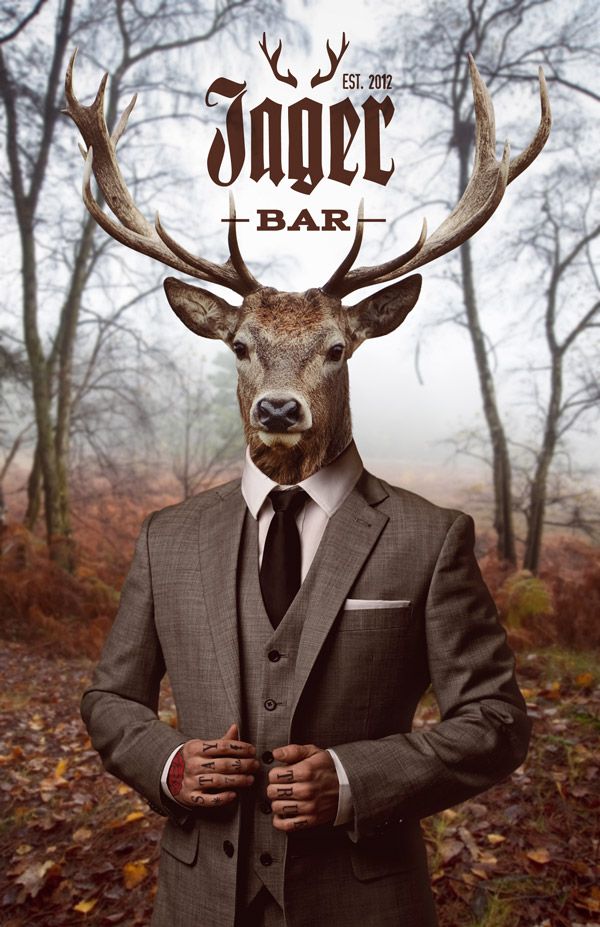 a man in a suit and tie with deer's head on the cover of a magazine