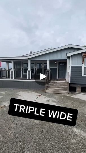 a mobile home with the words triple wide on it