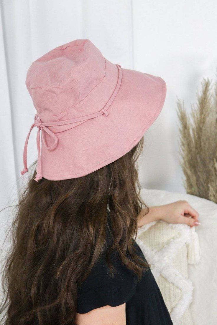 We love this light pink bucket hat! It has cute summer fun written all over it! Pink Brimmed Bucket Hat, Casual Bucket Hat For Vacation, Casual Wide Brim Sun Hat, Casual Lightweight Wide Brim Bucket Hat, Casual Wide Brim Bucket Hat Lightweight, Trendy Lightweight Adjustable Bucket Hat, Casual Brimmed Bucket Hat For Beach Season, Wide Brim Casual Bucket Hat For Beach Season, Trendy Cotton Sun Hat For Vacation