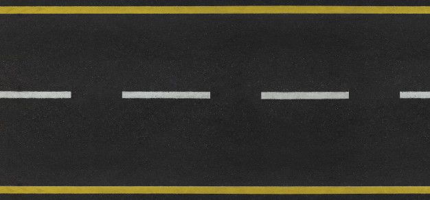 an overhead view of two white lines on the road