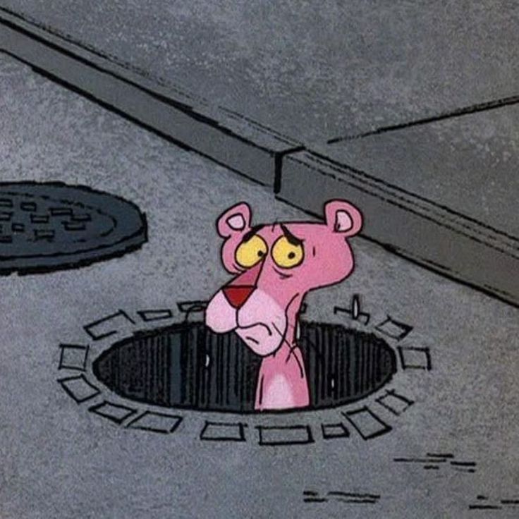 a pink cartoon character standing in a hole