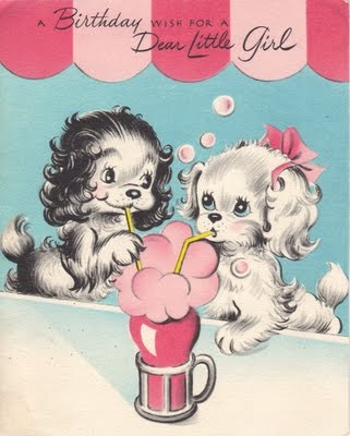 an old children's book with two puppies