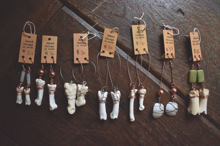 An assortment of coyote and bobcat toe bone earrings, plus a pair of otolith bones (second in from right), with various beads and stones. You can find pieces like this and more at www.deadthingsbysarah.com! Bone Earrings, Find Objects, Creating Jewelry, Copper Chain, Vintage Copper, Czech Glass Beads, Czech Glass, Semiprecious Stones, Precious Stones