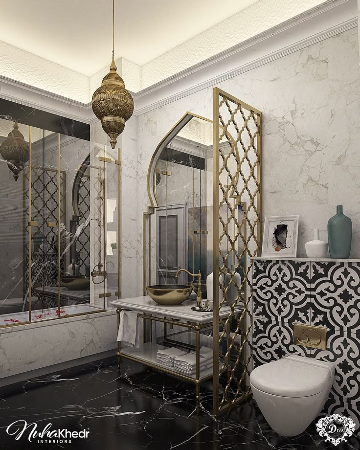 the bathroom is decorated in black and white marble, with gold accents on the walls