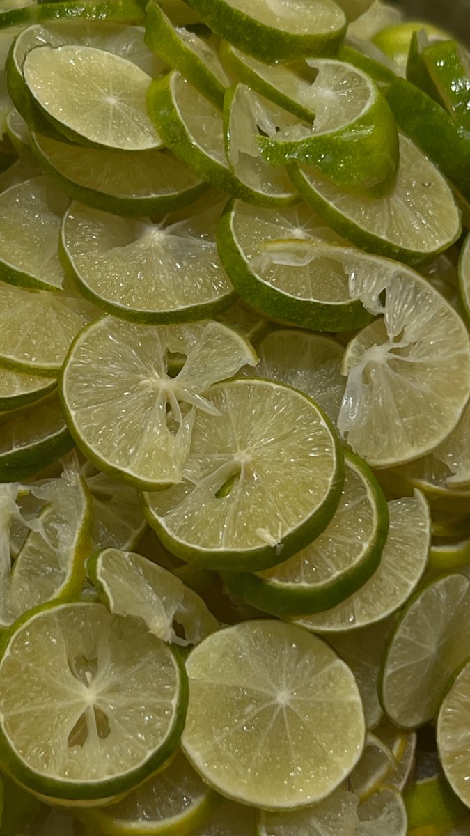 sliced limes are arranged on top of each other