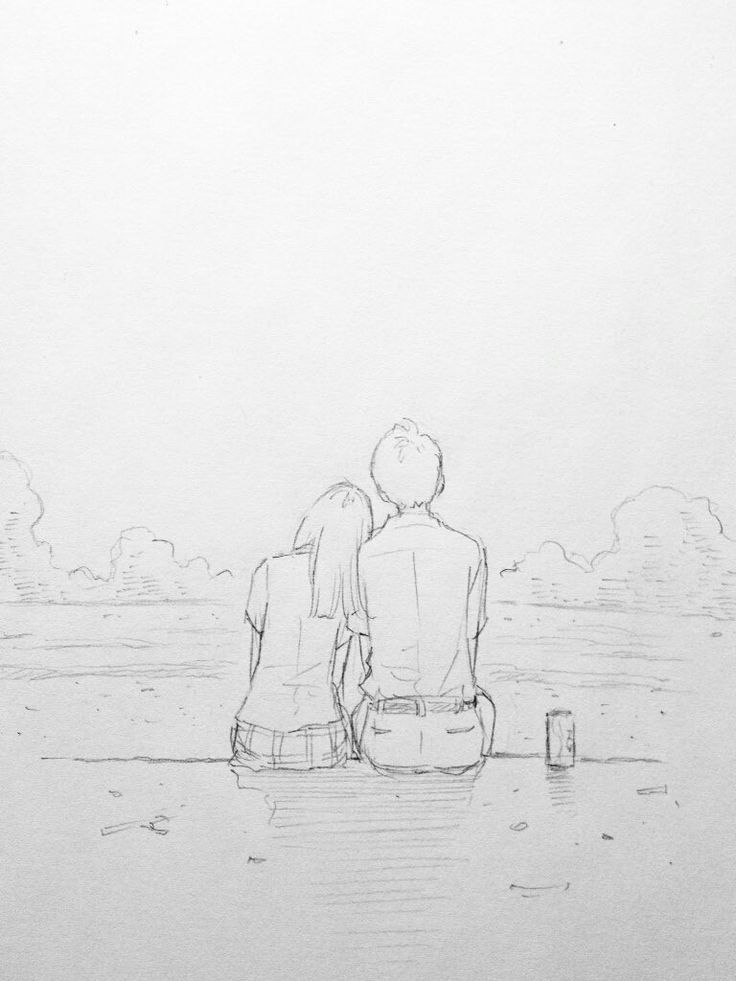 two people sitting on a bench looking out over the water