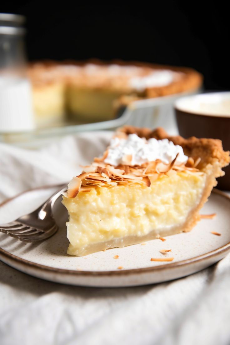 a piece of pie on a plate with a fork