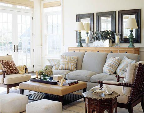 a living room filled with lots of furniture and decorating items in different styles, colors, and sizes