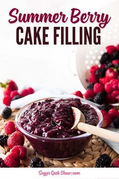 a bowl filled with berry cake filling on top of a table