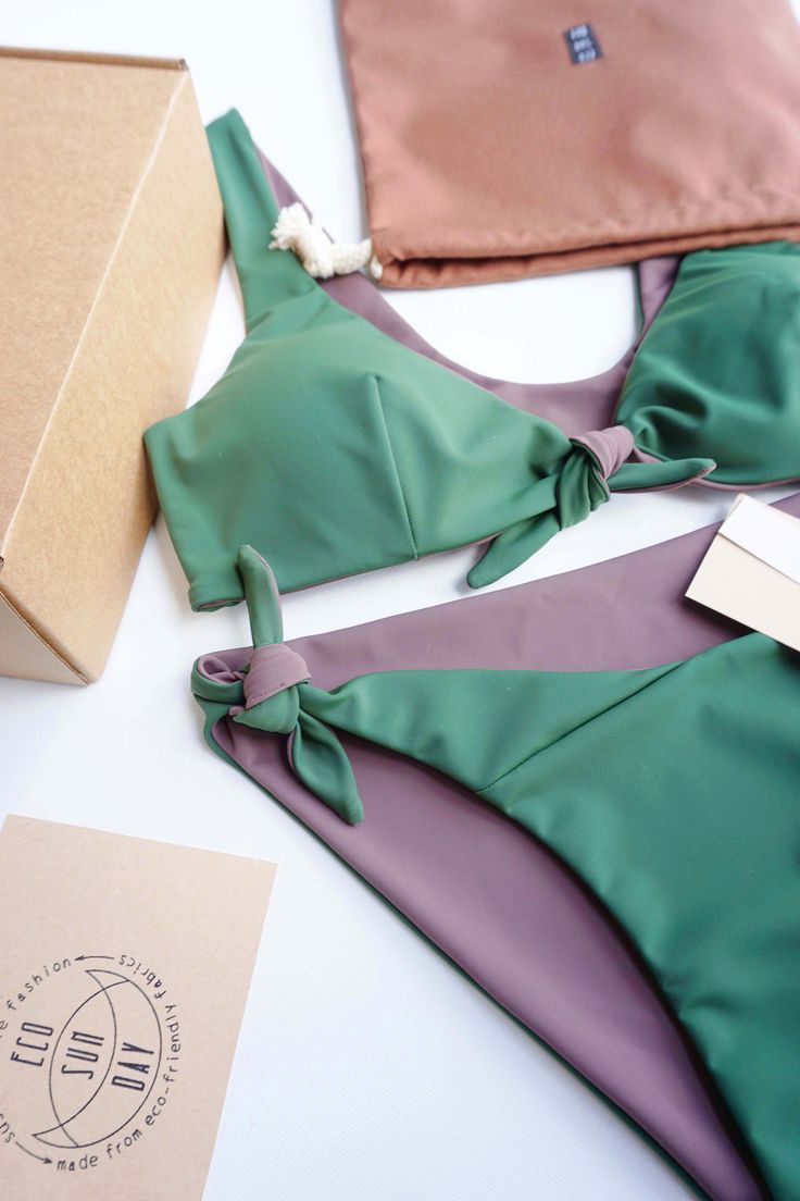 Reversible bikini set, XS size in green +taupe color, 6 in 1 design- color combinations to wear it. "Celine" top with soft cups and comfy ajustable bikini. Eco Sun Day all swimwear made from sustainable fabric which is made from recycled ocean plastic and fishing nets. Composition- 78% Recycled PA + 22% EA. Ethycally made in Lithuania Ready to ship, sending same day! In case You would like to oder this set in other size or color , chek this made to oder item: https://www.etsy.com/listing/1294174 Green Bra-friendly Tie-side Swimwear, Green Tie-side Bottom Swimwear, Bra Friendly, Celine Top, Sun Day, Fishing Nets, Sustainable Fabric, Sustainable Swimwear, Reversible Bikinis, Soft Cup