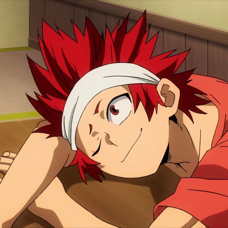 an anime character with red hair laying on the ground