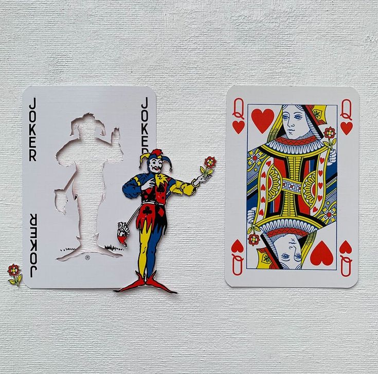 two playing cards, one with a joker and the other with a queen of hearts