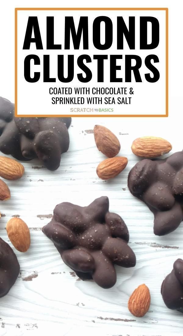 almond clusters are coated with chocolate and sprinkled with sea salt