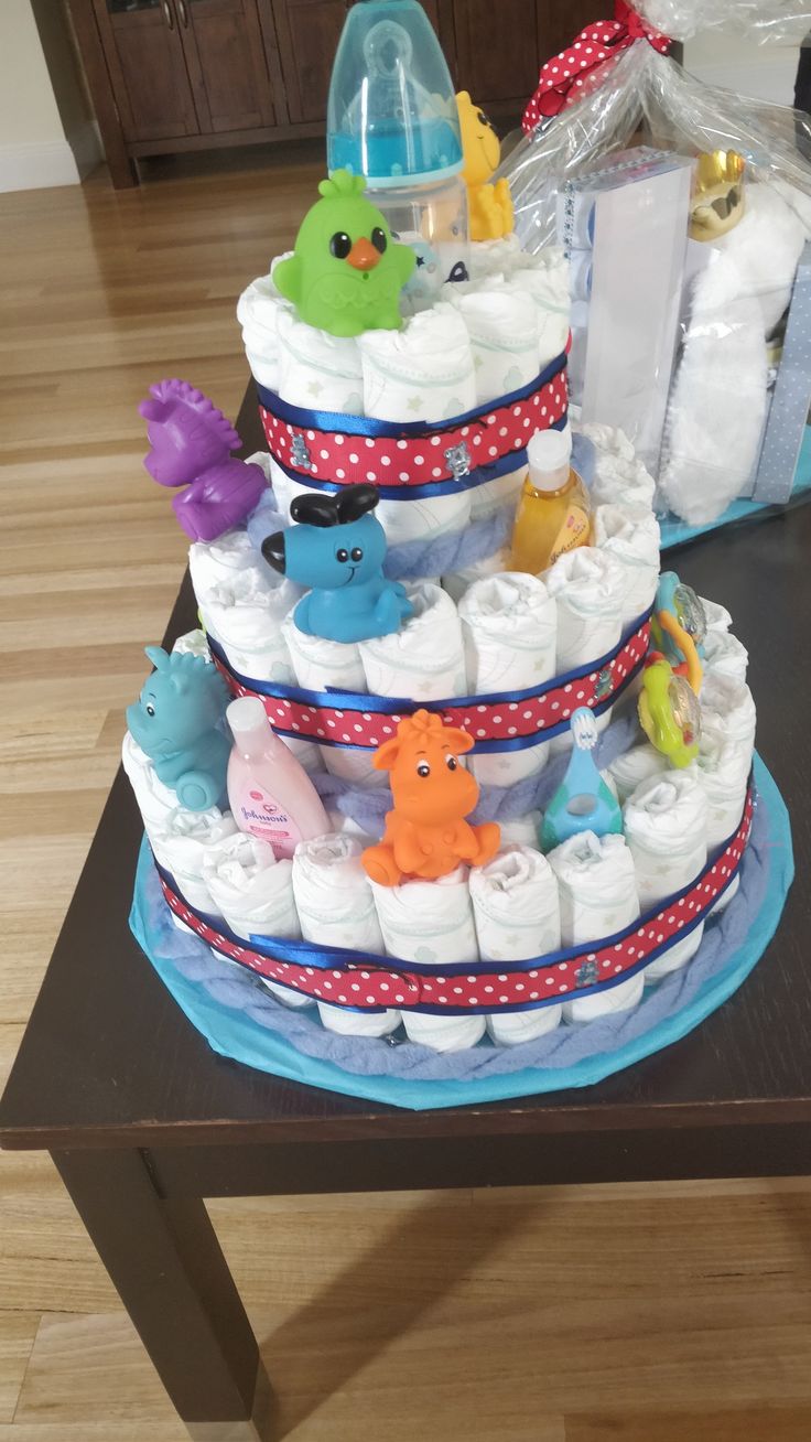 a cake made to look like it is stacked on top of each other with diapers