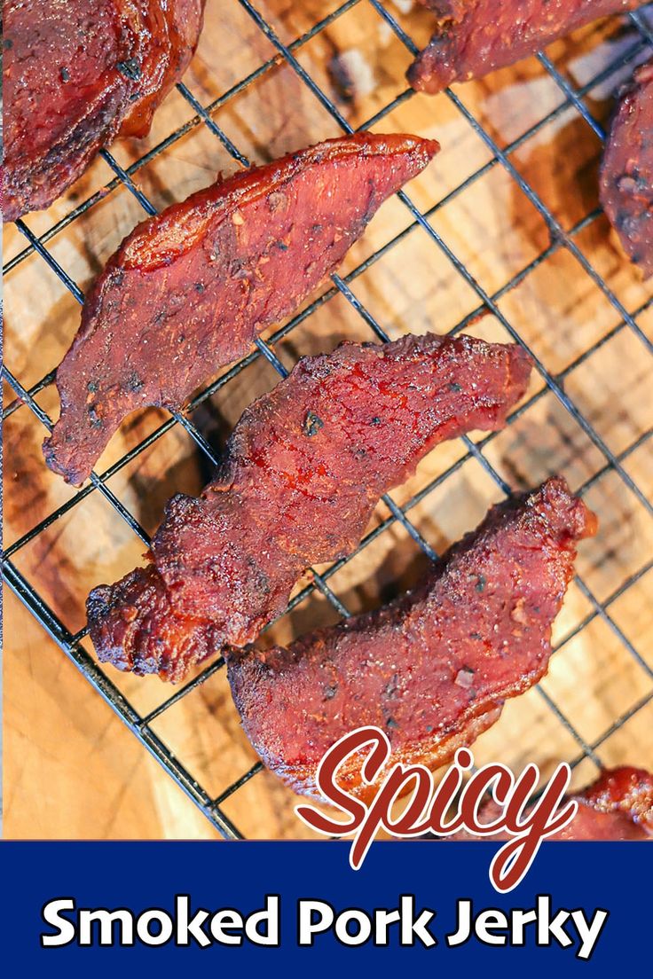 smoked pork jerky on a rack Beef Jerky Recipe Smoked Traeger, Air Fryer Pork Jerky, Jerkey Recipes Dehydrator Pork, Pork Belly Jerky, Pork Jerky Recipe Smokers, Pork Jerky Recipe Dehydrator, Pork Loin Jerky Recipe, Pork Jerky Recipe, Smoked Jerky Recipes