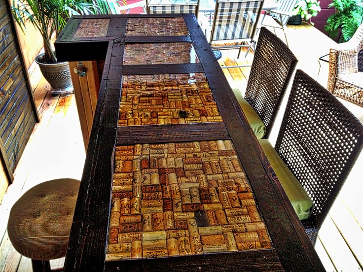 the table is made out of wood and has many different patterns on it's surface