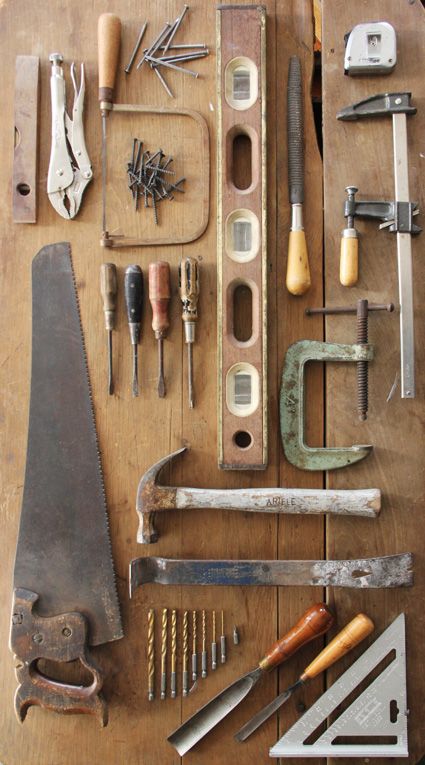 various tools are laid out on a table