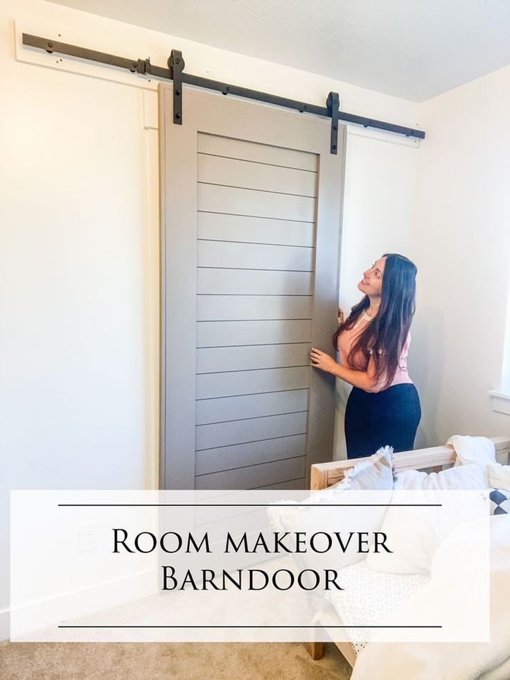 a woman standing in front of a door with the words room makeover barn door