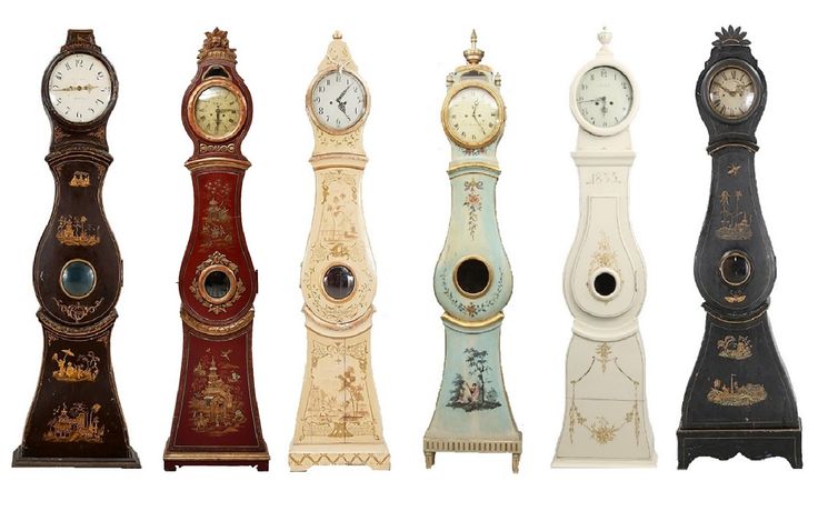 an assortment of antique clocks in different styles and colors, all painted to look like they are standing side by side