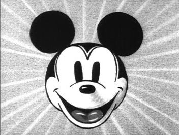 mickey mouse's face is shown in black and white