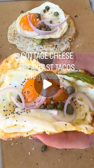 someone is holding an open pita sandwich with cheese and vegetables on it, along with the caption cottage cheese breakfast tacos