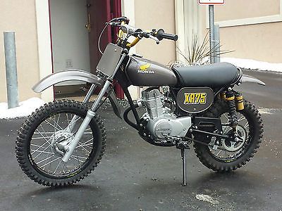 a dirt bike parked in front of a building