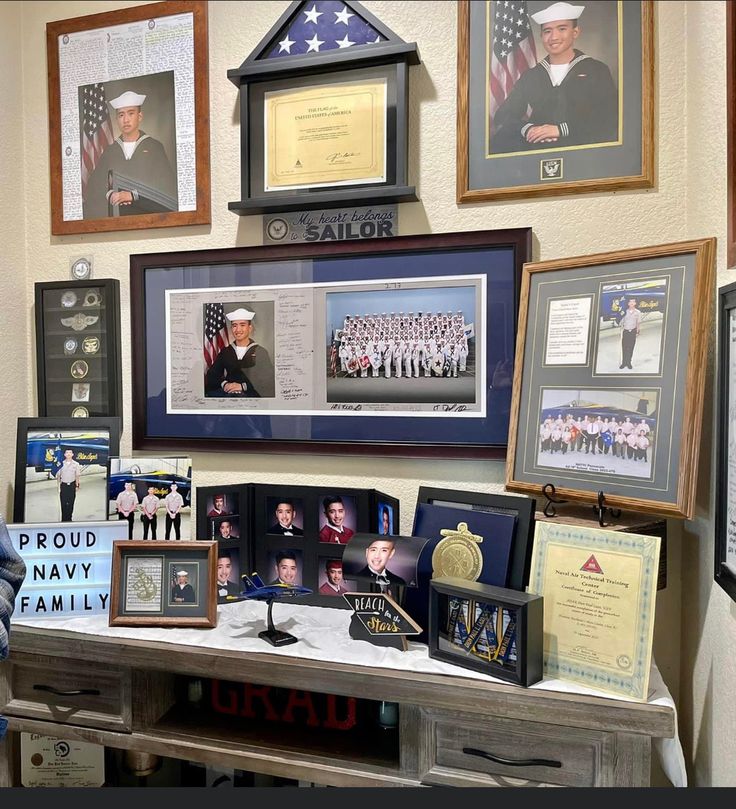 a desk with pictures and plaques on it