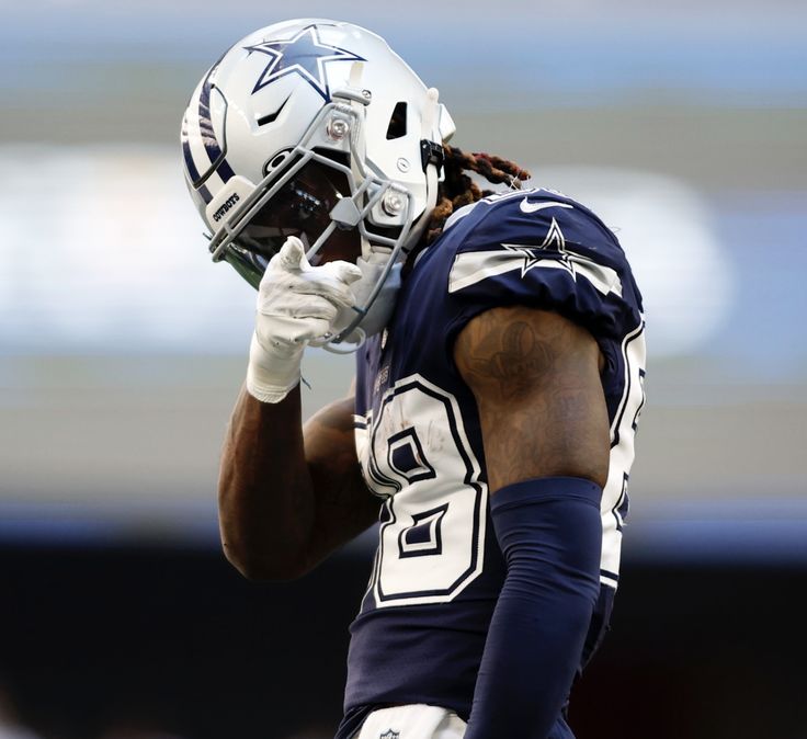 a close up of a football player wearing a helmet