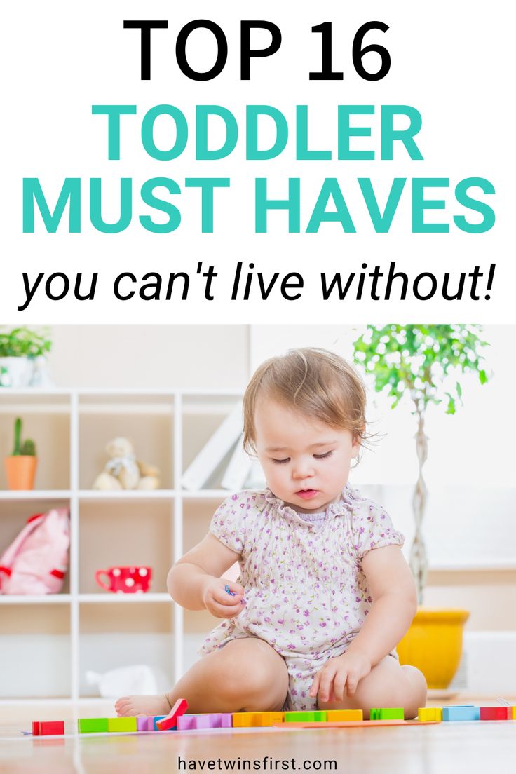 a toddler playing with toys on the floor and text overlay reads top 16 toddler must haves you can't live without