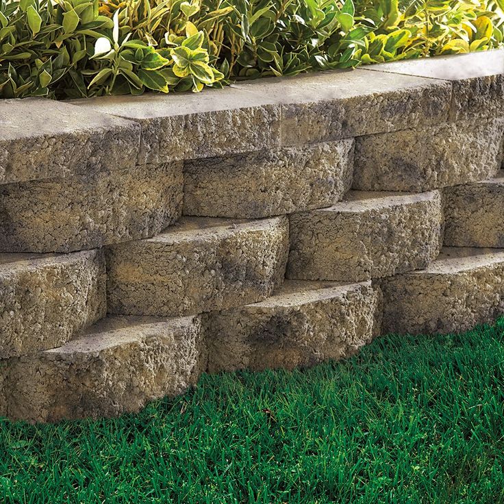 Basic wall is perfect for small landscaping and garden walls and may be used to easily build straight, curved or terraced walls to fit the contours of any landscape. Oldcastle 6-in H x 15.8-in L x 11.5-in D Tan/ Charcoal Concrete Retaining Wall Block in Gray | 129000215 Small Landscaping, Concrete Retaining Wall, Garden Concrete, Landscaping Blocks, Backyard Retaining Walls, Retaining Wall Block, Front Yards Curb Appeal, D Tan, Concrete Retaining Walls