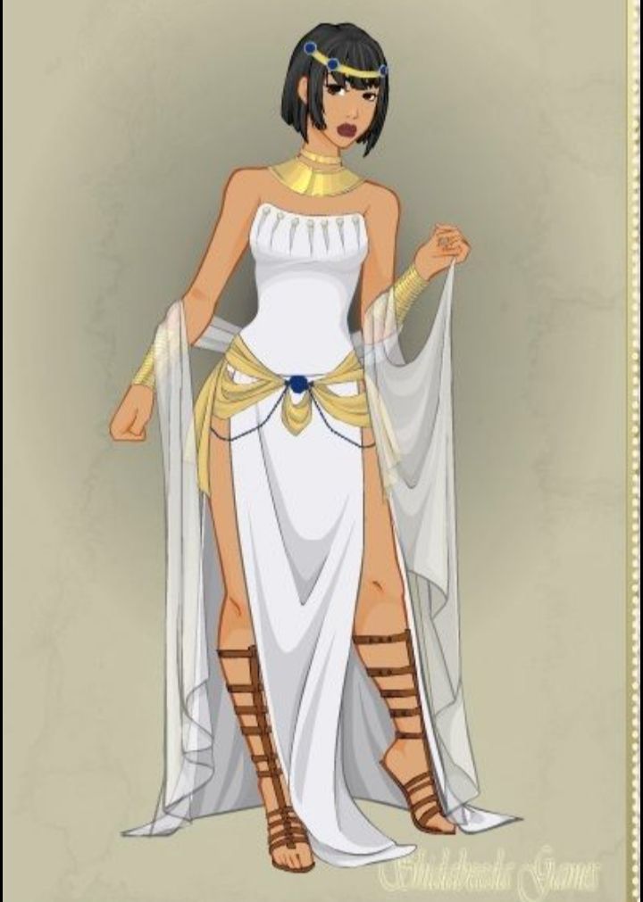 an egyptian woman dressed in white and gold