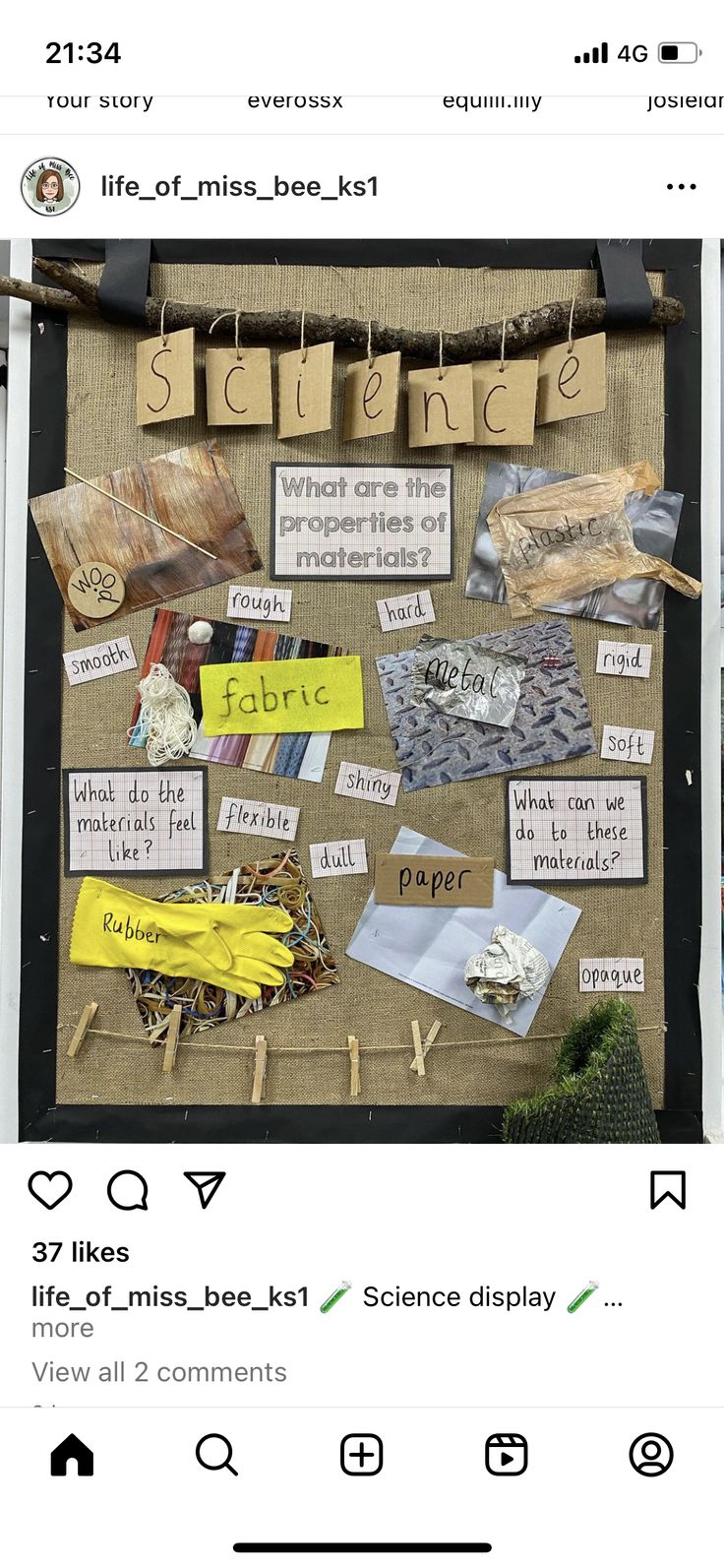 a bulletin board with words and pictures attached to it, along with clothes pins that spell out the word science