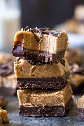 chocolate and peanut butter bars stacked on top of each other