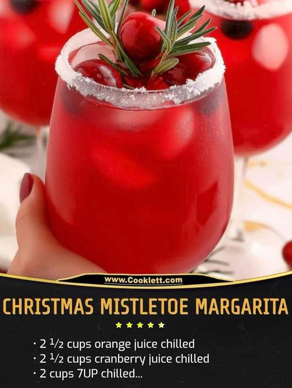 christmas mistletoe margarita recipe with cranberry juice and rosemary garnish