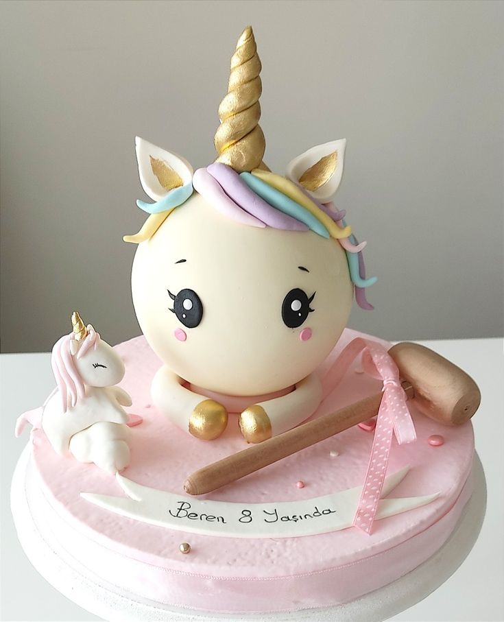 there is a cake that has a unicorn on it