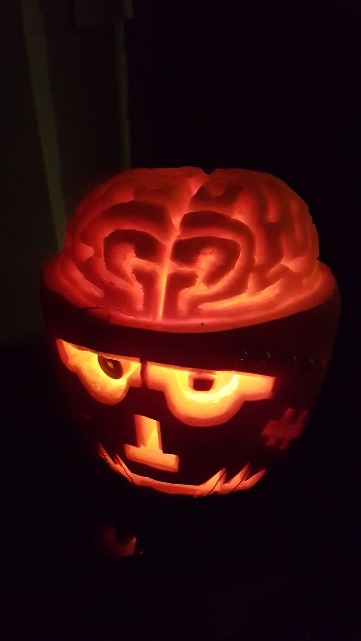 a pumpkin carved to look like a brain