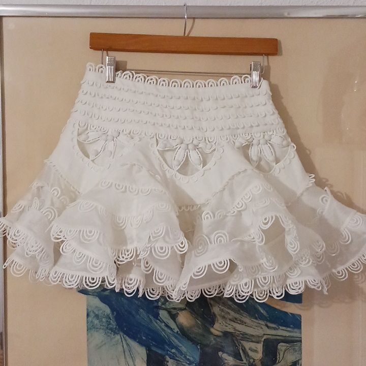 Zimmermann Silk/ Linen Skirt Size S Used Excellent Condition. 14" Waist 14.5" Length For Sale Skirt Only White Dress With Ruffles And Flowy Skirt, White Dresses With Ruffles And Flowy Skirt, White Ruffled Bottoms For Party, White Flowy Ruffled Dress, White Ruffled Mini Skirt For Party, White Flared Skirt Beach Dress, White Flared Beach Dress, Elegant Ruffled Mini Skirt For Summer, White Ruffled Skirt For Party