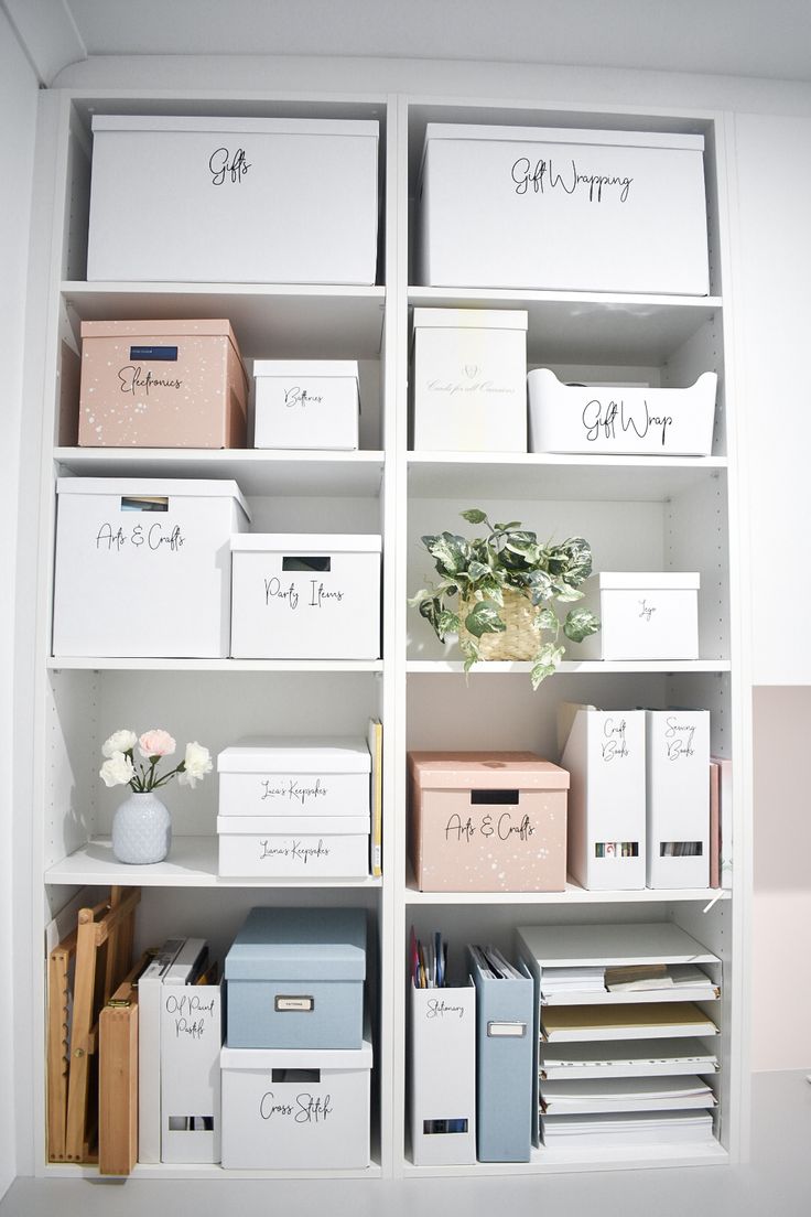 the shelves are organized with boxes and file folders