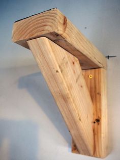 a piece of wood that has been made into a shelf