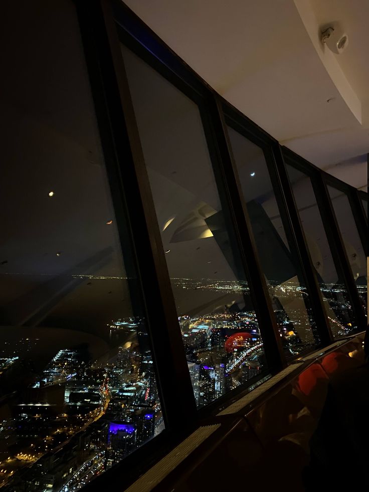 a view from the top of a skyscraper at night