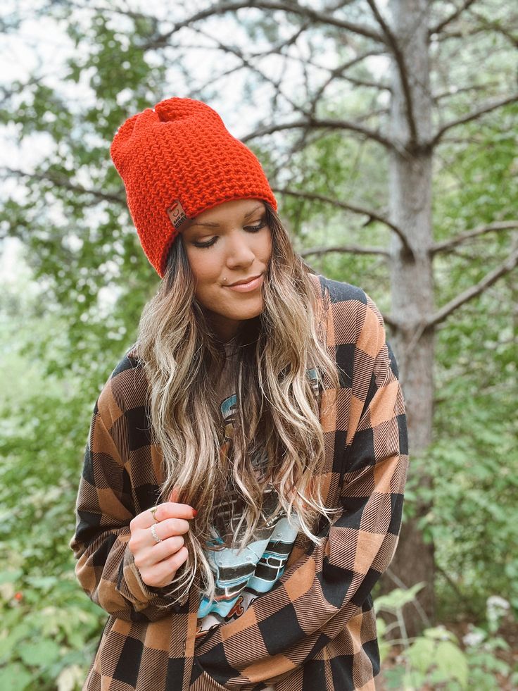 A classic everyday style for any outfit! All the warmth but no bulk. This beanie is a tighter fit, medium weight style. hand crocheted tighter stitch for extra warmth bright red 'Made in Minny' Faux Vegan Leather Tag in whiskey Medium weight, perfect for everyday 100% acrylic Spot clean if necessary, lay flat to dry Fitted Soft Knit Beanie For Fall, Fitted Beanie For Cold Weather In Fall, Cozy Red Beanie For Winter, Fitted Knitted Beanie For Fall, Casual Fitted Beanie For Fall, Cozy Red Winter Beanie, Soft Knit Beanie For Everyday In Fall, Soft Knit Beanie For Everyday Fall Wear, Everyday Soft Knit Beanie For Fall