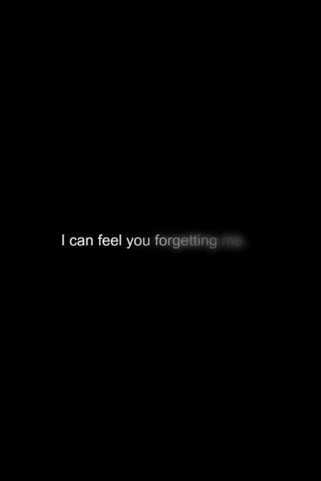 the words i can feel you forgeting are lit up against a dark black background