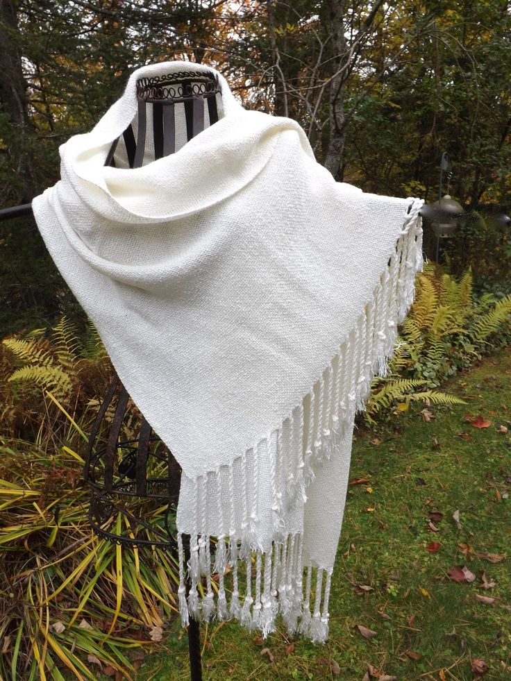 "I designed and wove this shawl in a white, textured rayon boucle with a beautiful sheen. My thought was to enhance, not detract from a wedding or other special dress for the intended use. Material: Rayon Size: 23\" wide x 64\" long with an additional 6\" fringe on each end Feather light Care Instructions: Hand wash, air dry Handmade in the USA Free domestic shipping 25 Years weaving experience" Mohair Scarf, Neutral Sweaters, Special Dress, Wedding Shawl, Wedding Wraps, Special Dresses, Hand Felted, Feather Light, Wool Hat