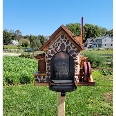 a mailbox in the shape of a giraffe