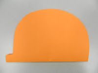 an orange hat is on display against a gray background