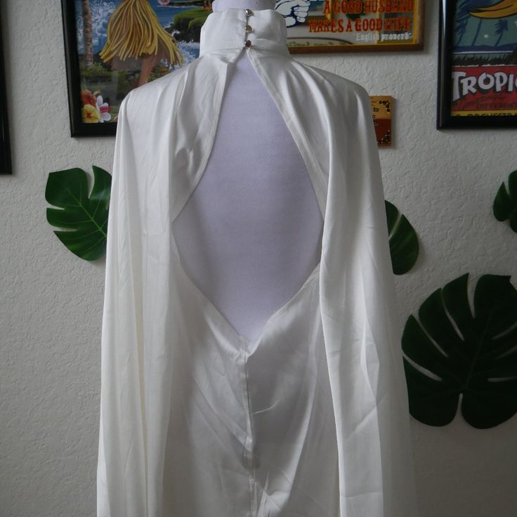 Selling This Stunning Bnwt White Flowy Dress That Has An Open Back And High Mockneck. The Material Feels Satiny. In Mint Condition, Never Worn. Big Angel Sleeves!!! Flows White Dress, Angel Costume Accessories, Angel Costume Modest, Unique Angel Costume, White Cowl Back Evening Dress, White Fitted Dress With Cowl Back, Chic White Dress With Cowl Back, Chic White Cowl Back Dress, White Cowl Back Wedding Dress