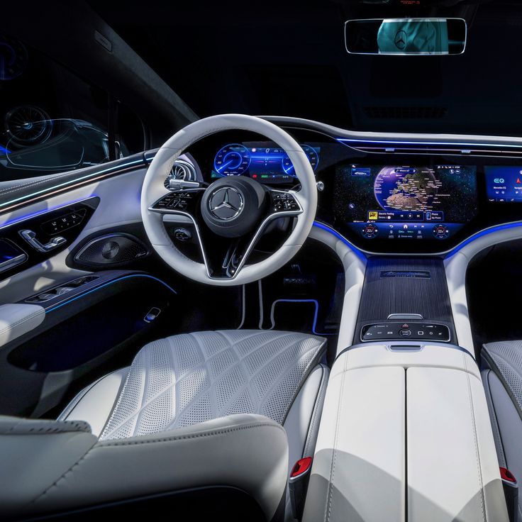 the interior of a mercedes s - class coupe with its touchscreen and steering wheel