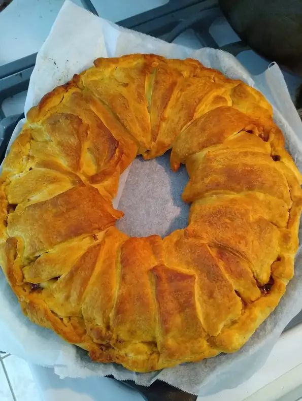 a pastry sitting on top of a piece of wax paper