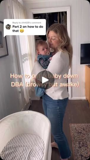 a woman holding a baby in her arms with the caption'how do you think that? '