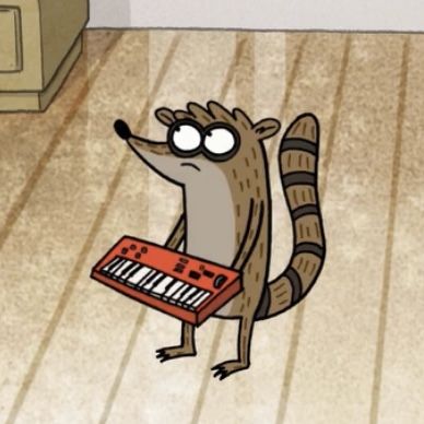 a cartoon racoon is playing the keyboard on the floor